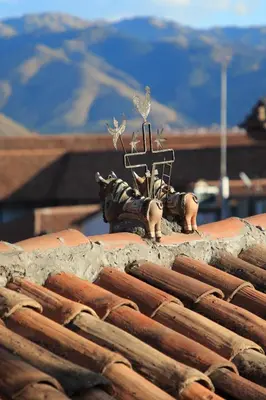 a group of figurines on top of a roof at Hotel & Mirador Los Apus in Cusco