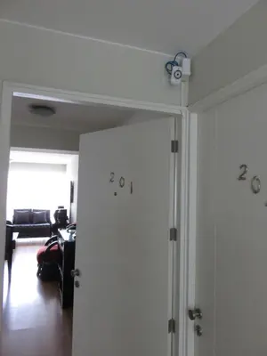 a door with numbers on it in a living room at Miraflores Modern Baja Balta in Lima