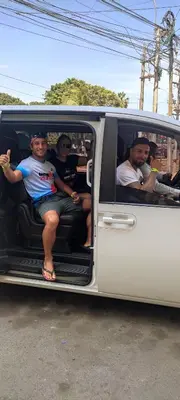 a group of people sitting in the back of a van at Casita Libertad Chorrillos in Lima