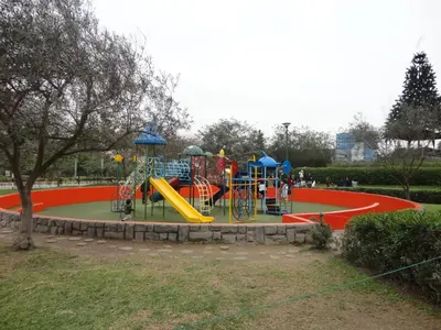 a playground in a park with a slide at San Borja, bello apartamento in Lima