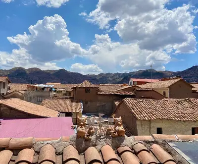 a view of a village with roofs at Hostal Casona Arrambide in Cusco