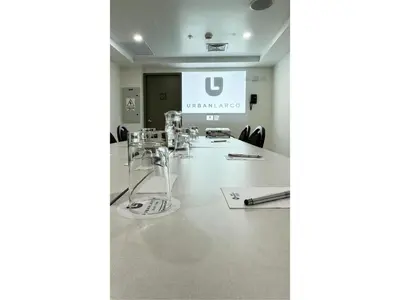 a conference room with a long table with chairs at Best Western Plus Urban Larco Hotel in Lima