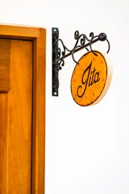 a door with a sign that reads ilico at El Encanto in Lunahuaná