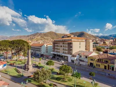a view of a city with mountains in the background at Sonesta Hotel Cusco in Cusco