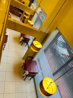 an overhead view of a restaurant with tables and umbrellas at Hotel Continental Lima in Lima