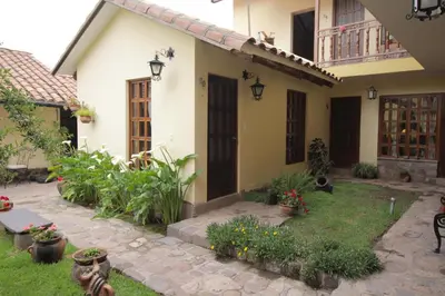 a house with a garden in front of it at 