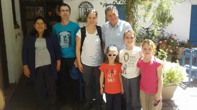 a group of people posing for a picture at Qoricancha B&B Cusco in Cusco