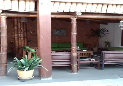 a pavilion with a couch and a table at La Casa Maruja in Lima