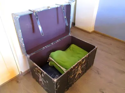 a wooden box with a green cushion in it at Best View apartment downtown Cusco in Cusco