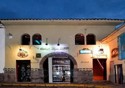 a building with a street light in front of it at Hotel Royal Qosqo in Cusco