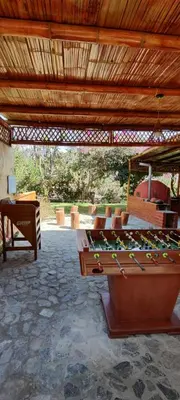 a pool table in a pavilion with at Casa de Campo Chinkay - Lunahuana in Lunahuaná