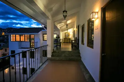 a hallway of a home at night at Atoq San Blas Hotel in Cusco