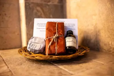 a bottle of wine in a basket on a counter at Inkaterra Machu Picchu Pueblo Hotel in Machu Picchu