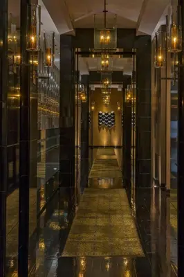 a hallway of a building with a flag on the wall at The Westin Lima Hotel & Convention Center in Lima