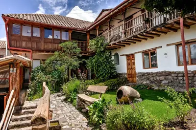 a house with a garden in front of it at El Balcón in Cusco