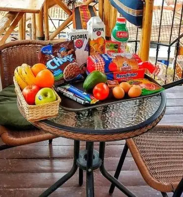 a table with food and snacks on top at Cities of the World - Apartments Cusco in Cusco
