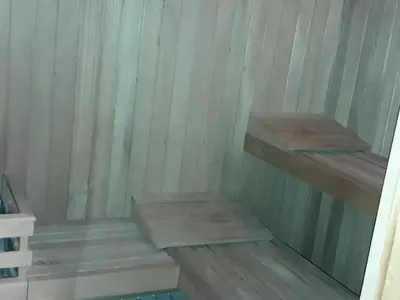 a sauna with wooden steps in a room at Miraflores Heart Apartment in Lima