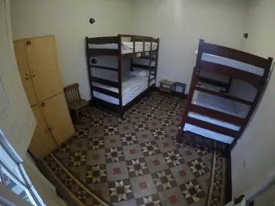 an overhead view of a room with bunk beds at 1900 Backpacker's Hostel in Lima