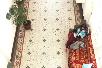 an overhead view of a floor with a potted plant at 1900 Backpacker's Hostel in Lima