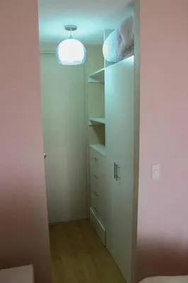 a room with a closet with a light in it at Condominio Uptown de 2 dormitorios in Lima