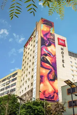 a building with a large painting on the side of it at ibis Lima Larco Miraflores in Lima