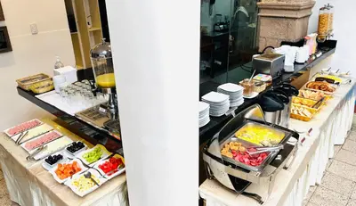 a buffet line with different types of food at Hotel Rojas Inn in Cusco