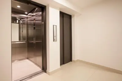 a walk in closet with a glass door at Lima Walking Apartments - Central Miraflores in Lima