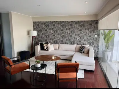 a living room with a white couch and chairs at El Golf los inkas luxury Penthouse in Lima