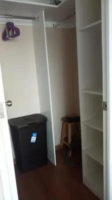 a room with a closet with a bunk bed at Lima Flats in Lima