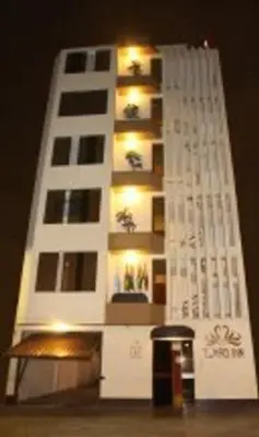 a model of a building with lights on it at Hotel Sumaq Inn Sac in Lima