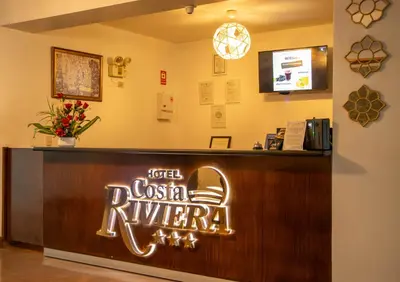 a sign that says hotel casa narretera in a lobby at Hotel Costa Riviera in Mala