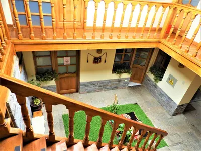 an overhead view of a building with a staircase at Picaflor Tambo Guest House in Ollantaytambo
