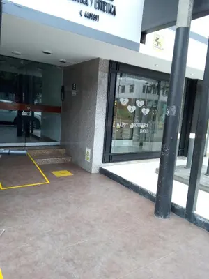 a store front of a building with a sign on the window at Teté in Lima
