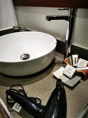 a white sink on a counter in a bathroom at Hotel Andes Urubamba in Urubamba
