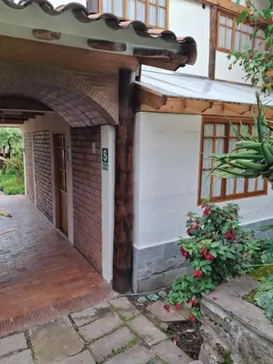 an entrance to a house with a brick building at Casona La Recoleta in Cusco
