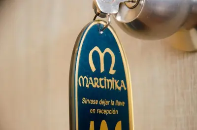 a tag that is attached to a hanging object at Martinika in Lima
