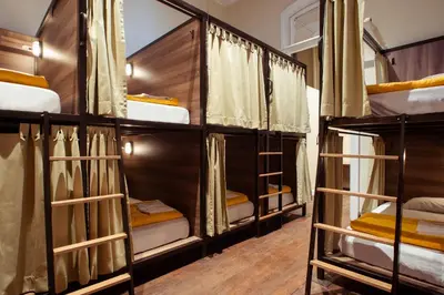 a group of bunk beds in a room at Viajero Lima - Barranco Hostel in Lima