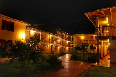 a night view of a building with lights at Tunupa Lodge Hotel in Ollantaytambo