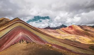 a painting of a mountain with people standing on a hill at Casa ValPer in Cusco