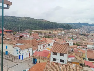 an aerial view of a town with houses and roofs at Marvelous Plaza in Cusco