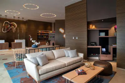 a living room with a couch and a table at Fairfield by Marriott Lima Miraflores in Lima
