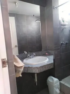 a bathroom with a sink and a toilet at El Refugio in Punta Hermosa