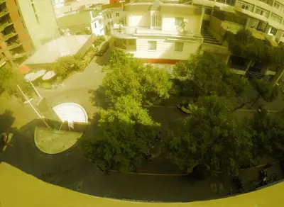 an overhead view of a park with trees and buildings at Waldorf in Lima