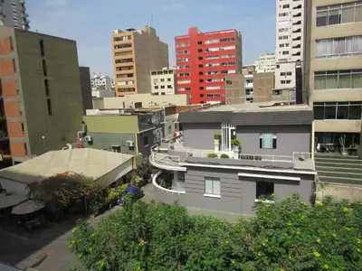 a view of a city with tall buildings at Residencial Waldorf in Lima