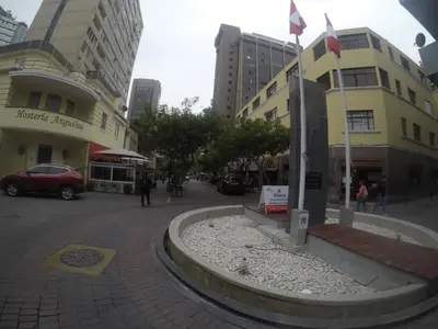 a street in a city with tall buildings at Residencial Waldorf in Lima