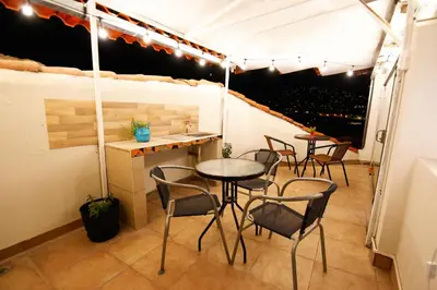 a group of tables and chairs in a tent at CASONA TORDO - A 3 Cdras de la Plaza - Habitaciones con baño privado in Cusco