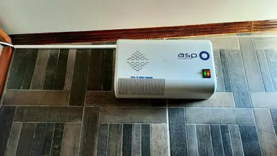 a appliance sitting on the floor in a room at luxury Andino Ciudad real & 1 bed in Lima