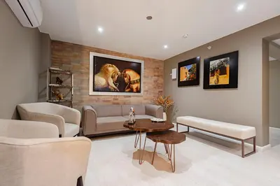 a living room with a couch and a table at Equo Hotel Boutique in Lima