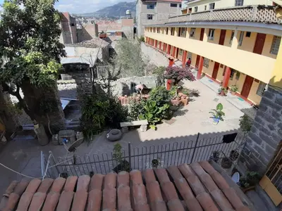 an overhead view of a courtyard in a building at HOSPEDAJE CENTRAL in Ayacucho