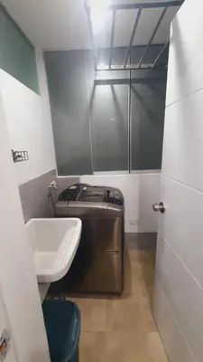 a small bathroom with a sink and a toilet at Departamento exclusivo ica in Ica